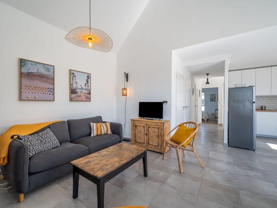 Furniture, Property, Table, Picture Frame, Wood, Couch, Comfort, Interior Design, Orange, Floor