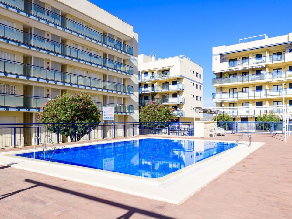 Building, Sky, Plant, Window, Water, Azure, Swimming Pool, Urban Design, Tower Block, Condominium