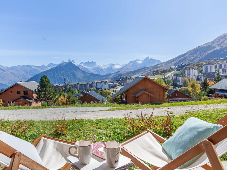 Sky, Property, Mountain, Building, Wood, House, Outdoor Furniture, Plant, Natural Landscape, Urban Design