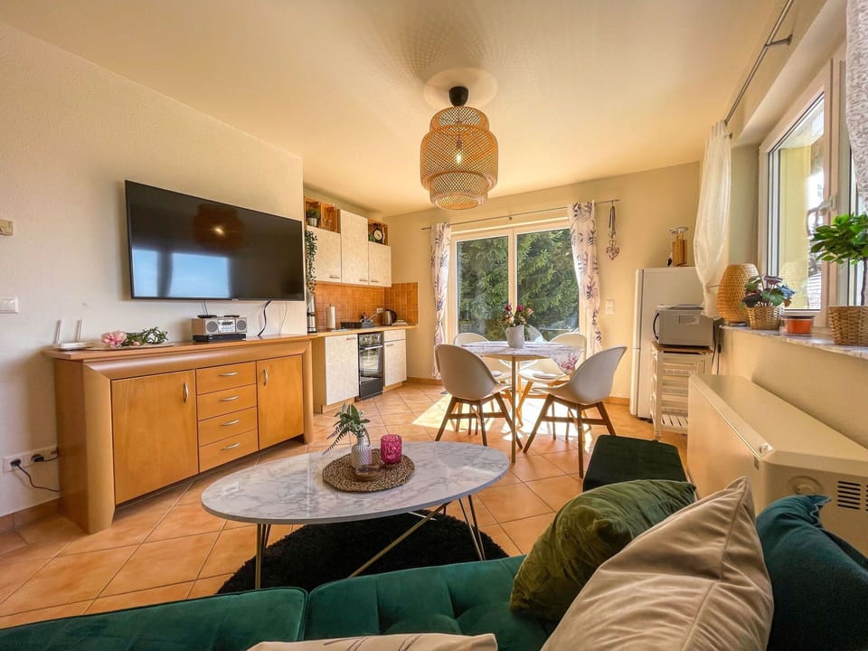 Furniture, Property, Cabinetry, Plant, Houseplant, Window, Couch, Wood, Lighting, Interior Design