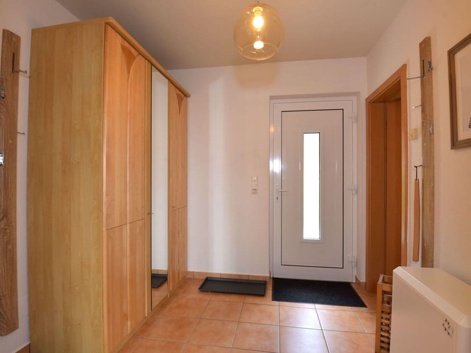 Door, Wood, Interior Design, Wood Stain, Floor, Home Door, Real Estate, Flooring
