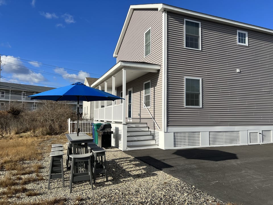 Farmers porch, backyard high top for 8, 3 burner Weber propane grill.