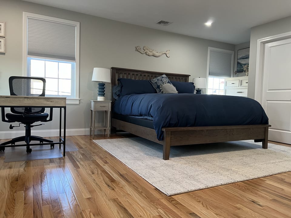 Master bedroom with king bed and dedicated work space