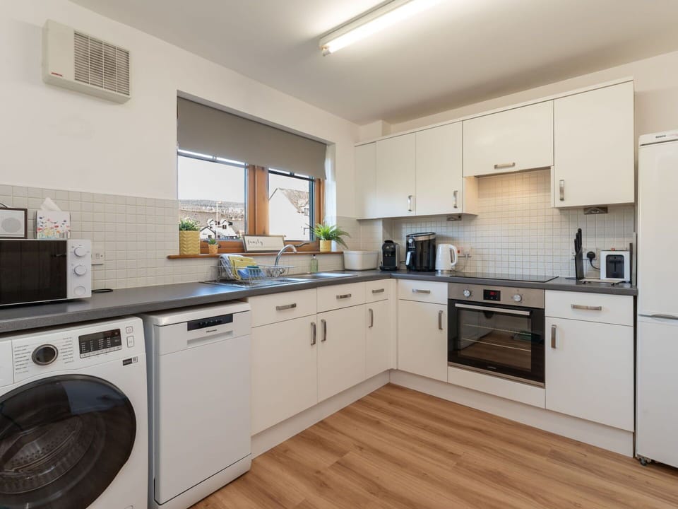 Flooring, Interior Design, Major Appliance, Kitchen Appliance, Wood, Ceiling, Floor, Countertop, Kitchen, Cabinetry