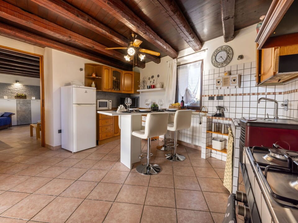 Property, Cabinetry, Table, Kitchen, Countertop, Wood, Interior Design, Building, Chair, Living Room