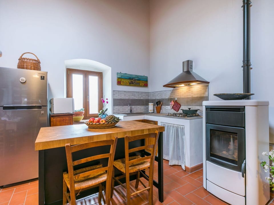 Furniture, Property, Cabinetry, Table, Wood, Kitchen, Interior Design, Orange, Countertop, Flooring