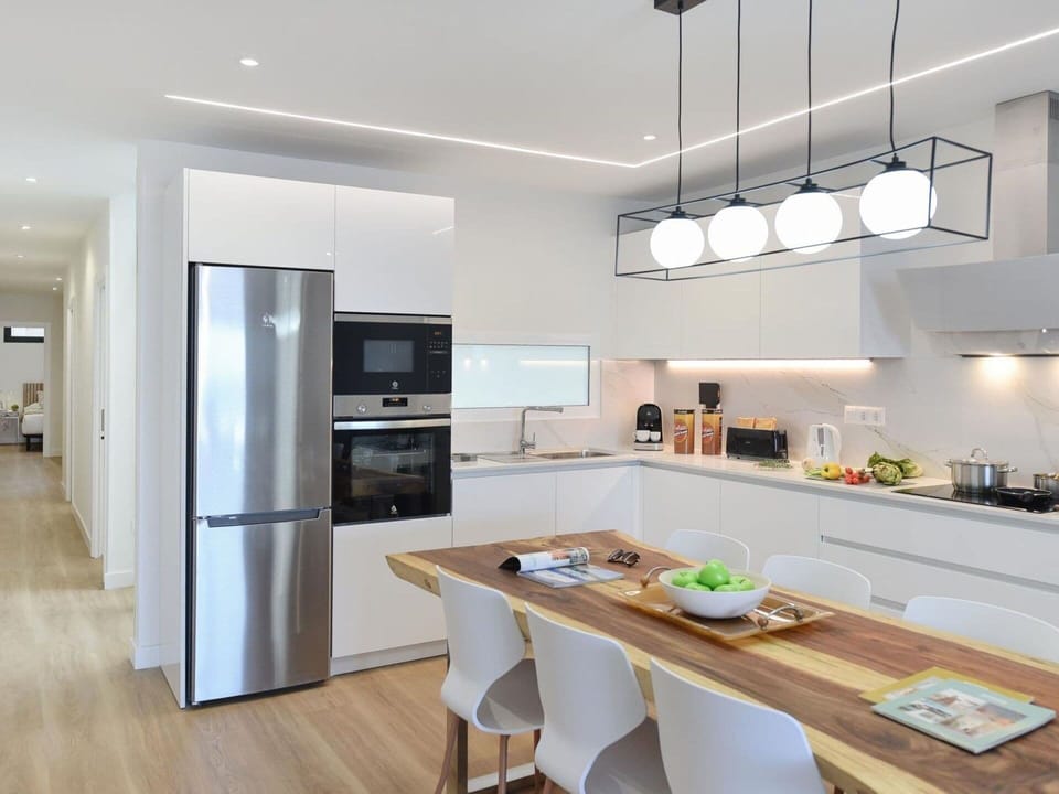 Cabinetry, Countertop, Property, Furniture, Kitchen, Kitchen Appliance, Wood, Table, Home Appliance, Kitchen Stove