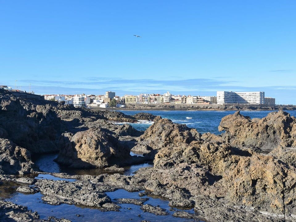 Water, Sky, Azure, Coastal And Oceanic Landforms, Lake, City, Horizon, Landscape, Headland, Cityscape