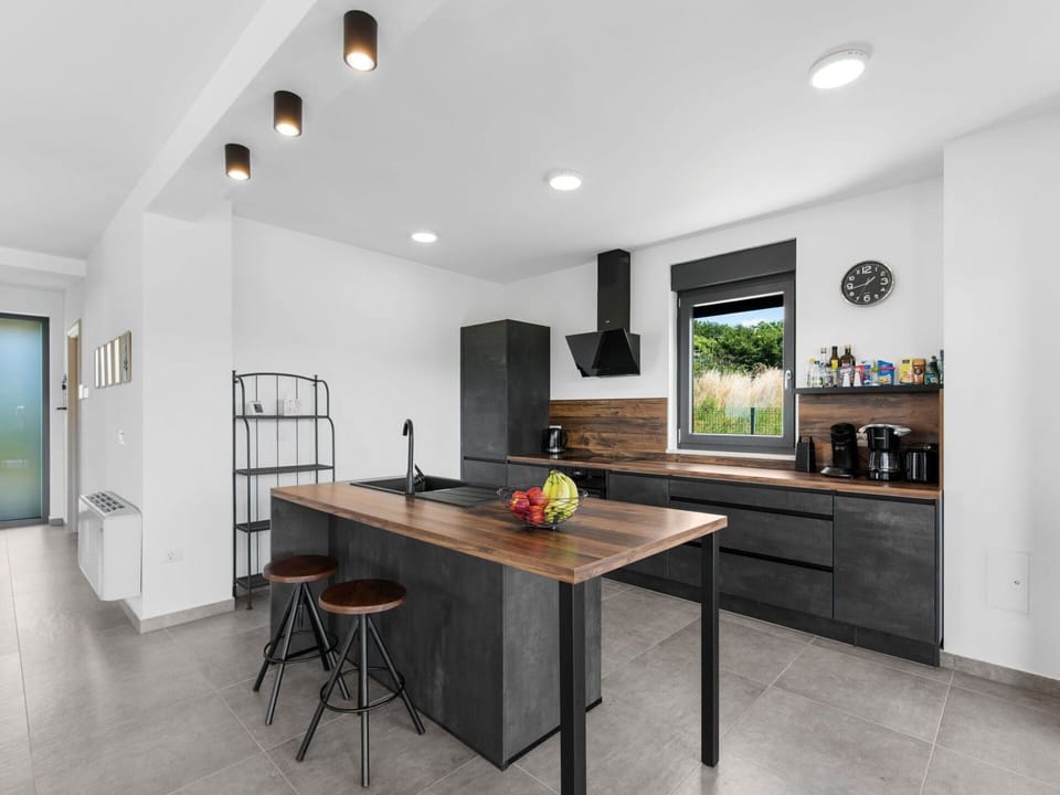 Table, Furniture, Property, Countertop, Cabinetry, Wood, Interior Design, Flooring, Living Room, Floor
