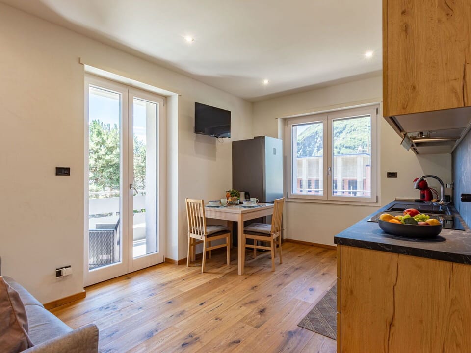 Property, Window, Table, Wood, Interior Design, Cabinetry, Flooring, Floor, Shade, Countertop