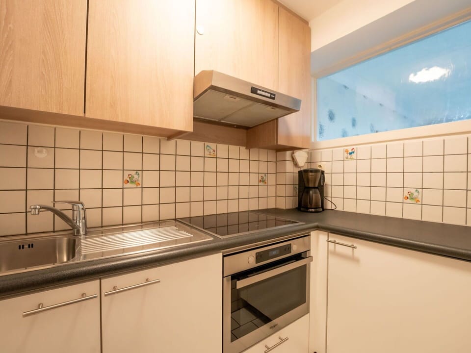 Cabinetry, Countertop, Property, Kitchen Sink, Sink, Kitchen Stove, Kitchen, Kitchen Appliance, Wood, Building