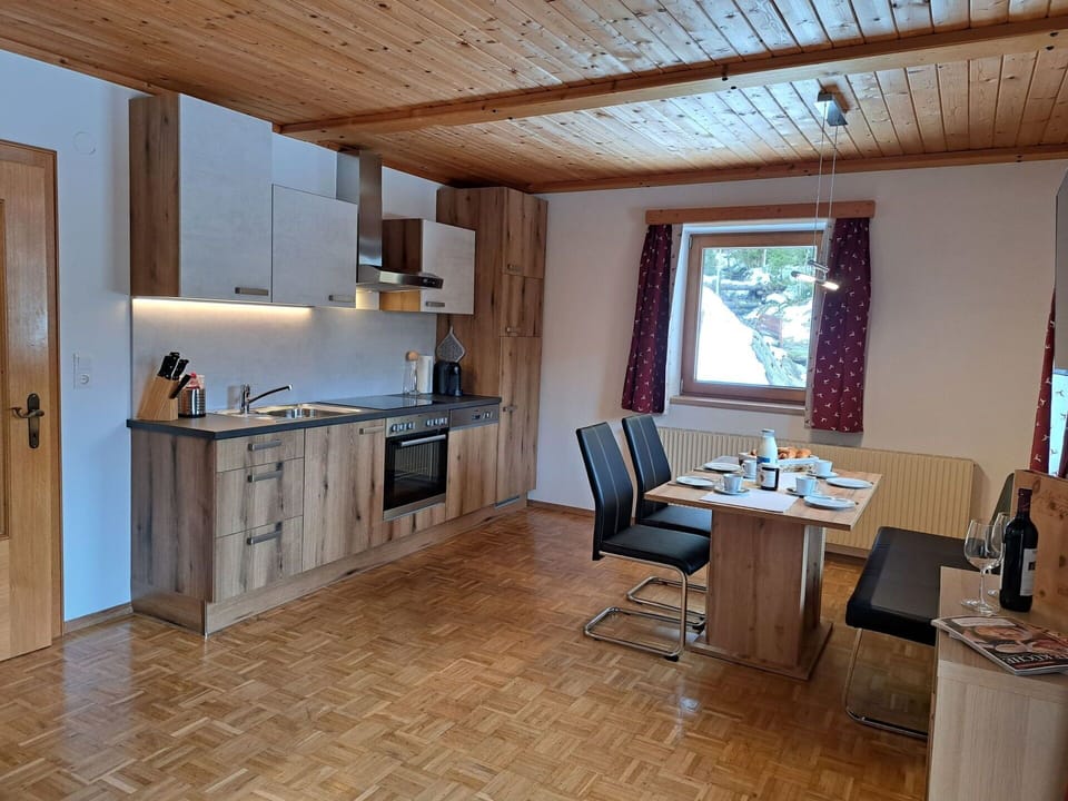 Furniture, Cabinetry, Wood, Table, Living Room, Building, Chair, Interior Design, Flooring, Floor