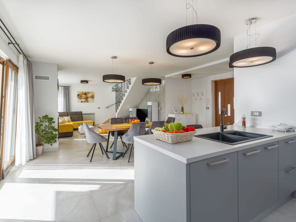 Cabinetry, Furniture, Plant, Kitchen Sink, Table, Sink, Building, Countertop, Chair, Houseplant