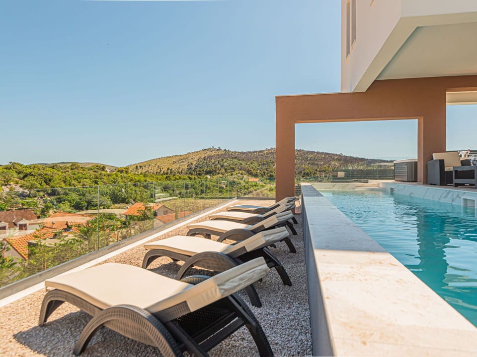 Water, Sky, Plant, Outdoor Furniture, Swimming Pool, Shade, Wood, Condominium, Leisure, Residential Area