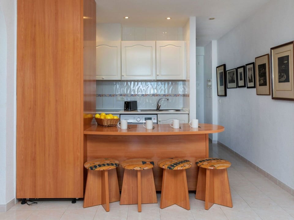 Furniture, Property, Plant, Comfort, Textile, Wood, Interior Design, Cabinetry, Houseplant, Flooring