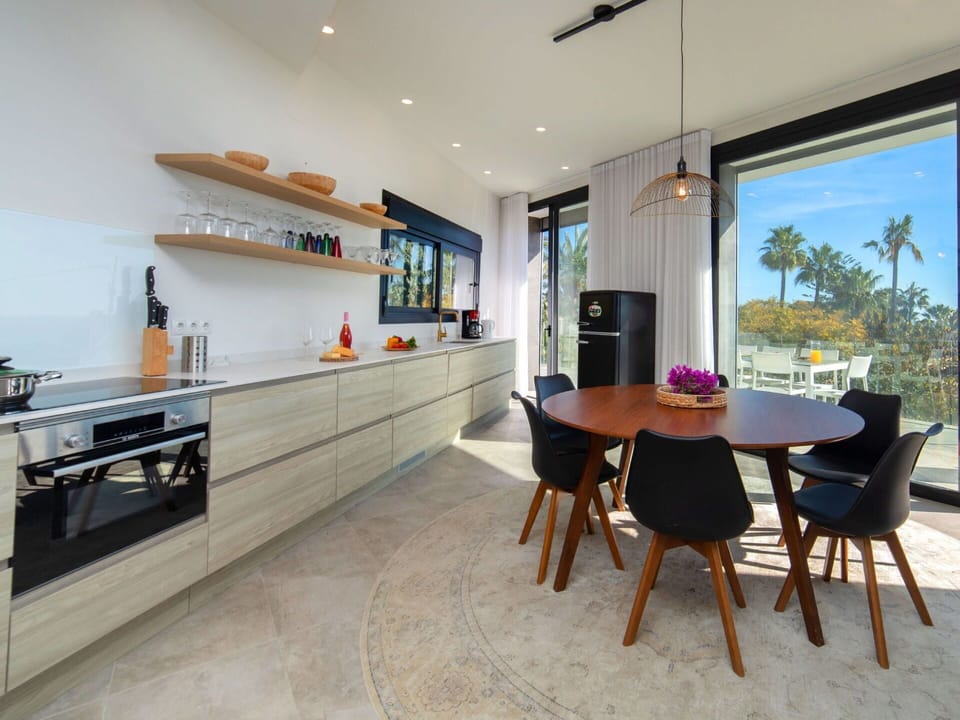 Furniture, Property, Plant, Comfort, Textile, Wood, Interior Design, Cabinetry, Houseplant, Flooring