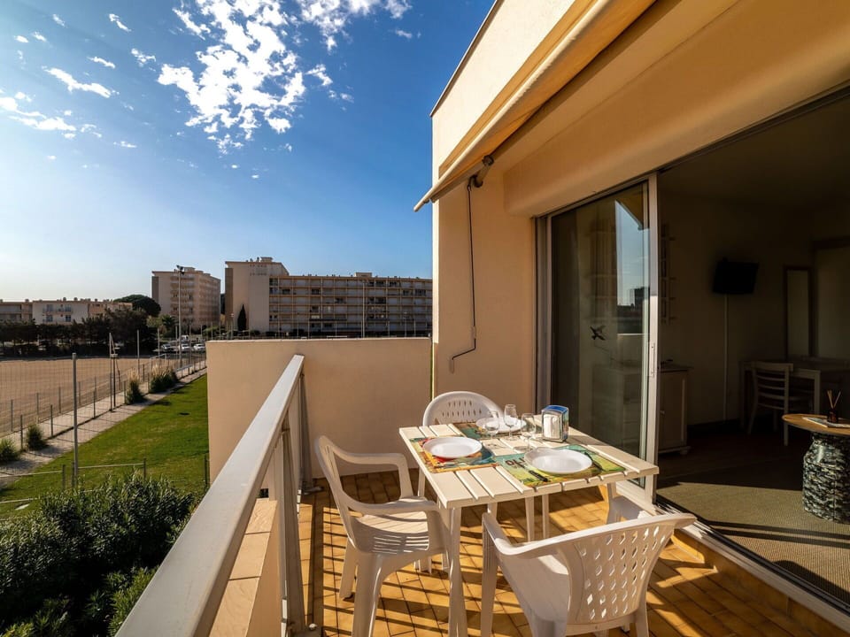 Sky, Plant, Property, Building, Table, Window, Cloud, Chair, Lighting, Architecture
