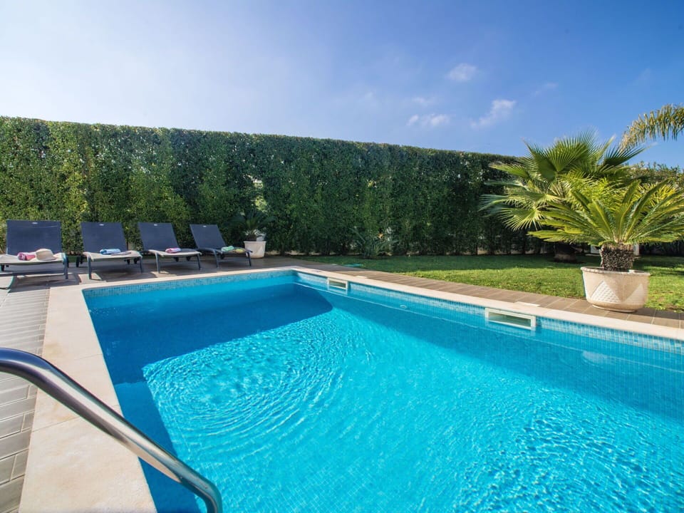 Water, Sky, Plant, Property, Swimming Pool, Azure, Rectangle, Shade, Building, Tree