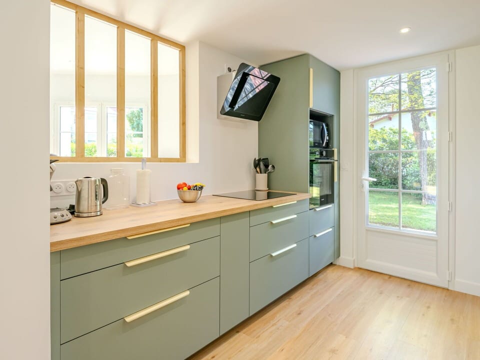 Kitchen, Countertop, Interior Design, Flooring, Cabinetry, Kitchen Appliance, Wood, Furniture, Floor, Major Appliance