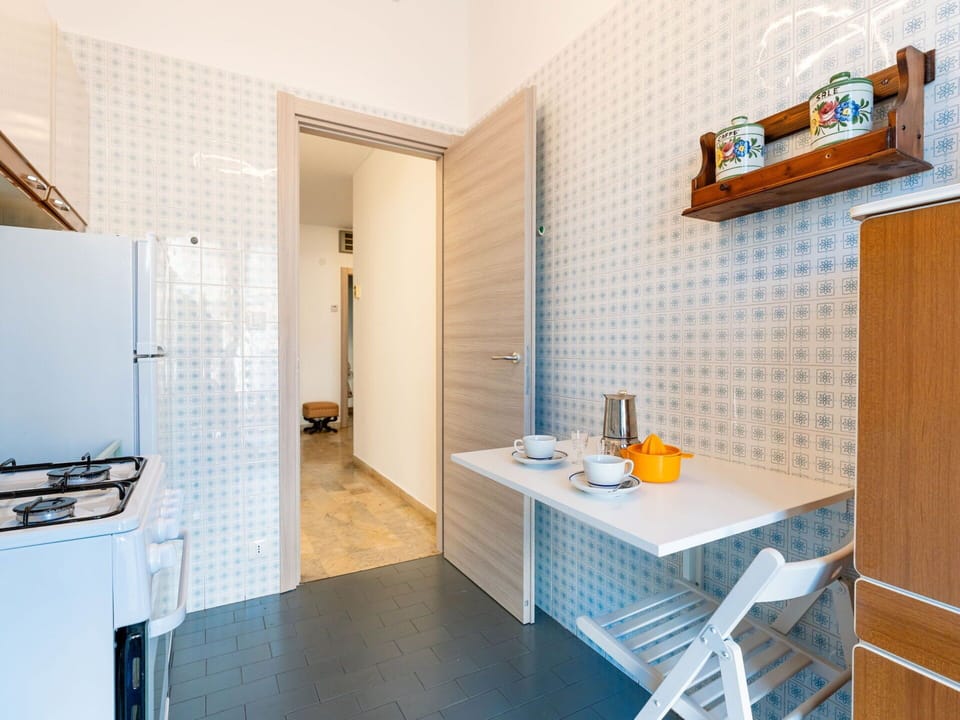 Flooring, Interior Design, Floor, Furniture, Kitchen, Room, Countertop, Major Appliance, Ceiling, Apartment