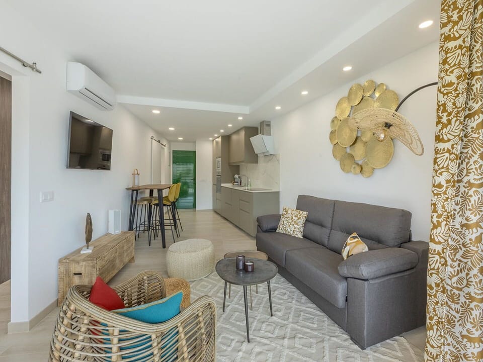 Couch, Furniture, Property, Table, Picture Frame, Interior Design, Lighting, Comfort, Living Room, Floor