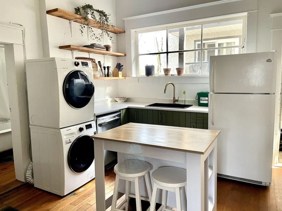 Updated rustic vibes kitchen with dishwasher, washer and dryer and gas stove available for guests. Plenty of pots and pans, Nespresso machine, french press and regular coffee machine.