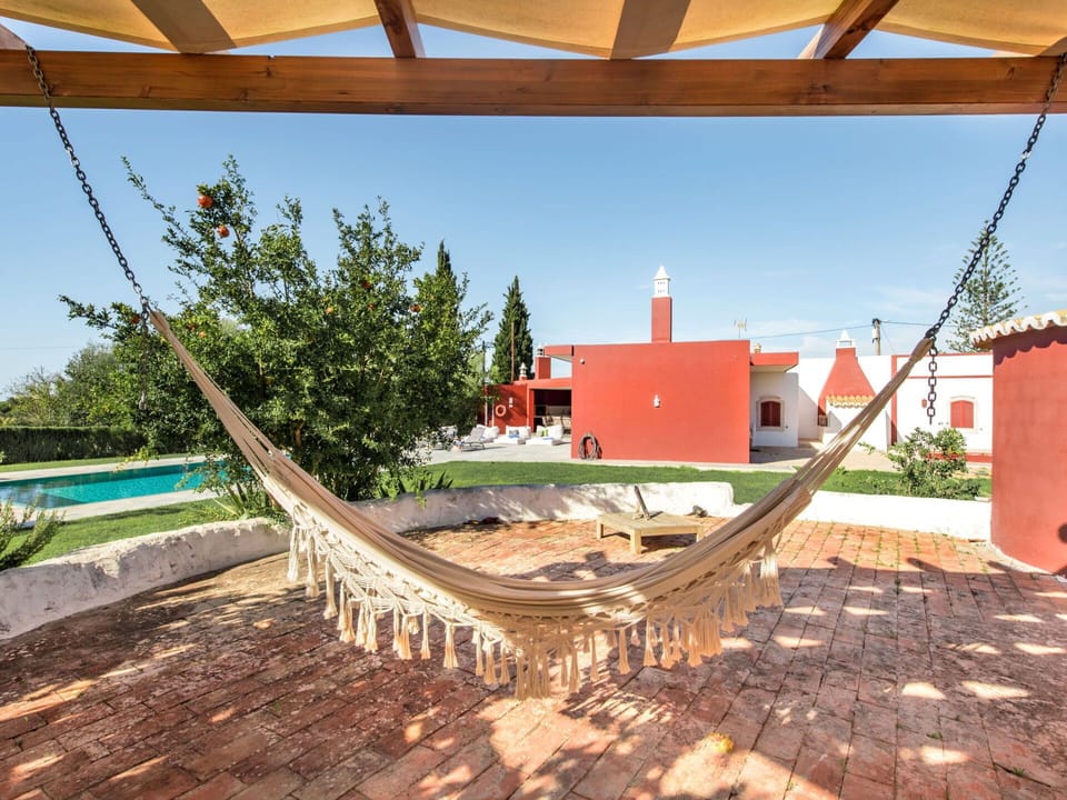 Sky, Wood, Shade, Landscape, Leisure, Roof, Urban Design, Building, Plant