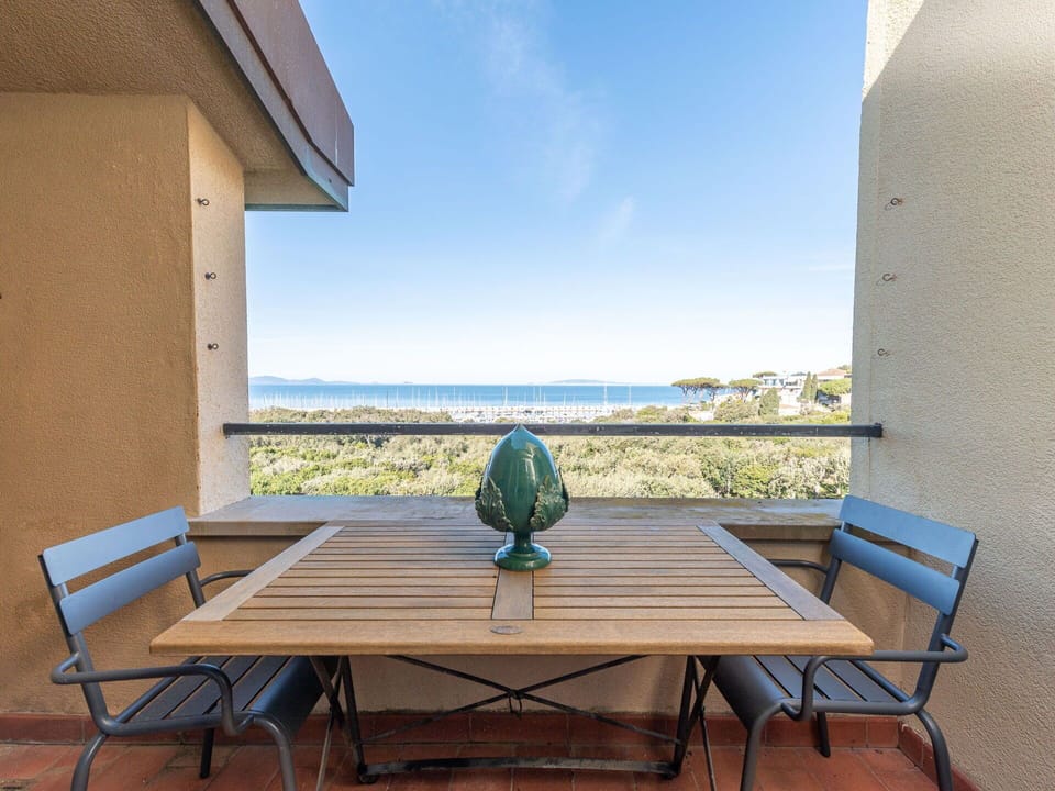 Table, Sky, Furniture, Property, Building, Water, Azure, Wood, Plant, Shade