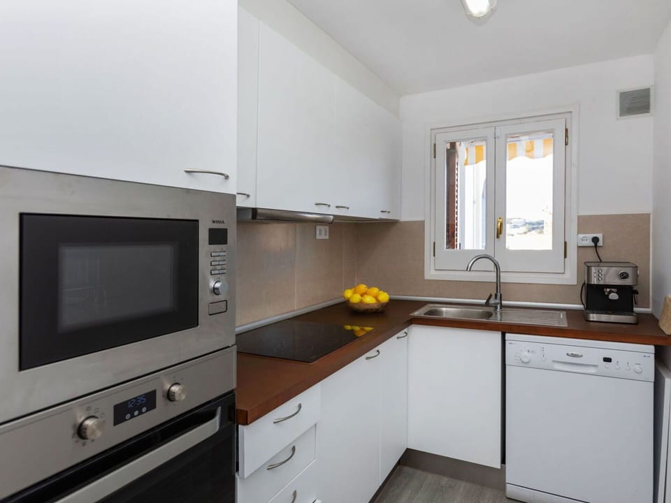 Cabinetry, Countertop, Kitchen Sink, Property, Sink, Kitchen Appliance, Building, Window, Home Appliance, Drawer