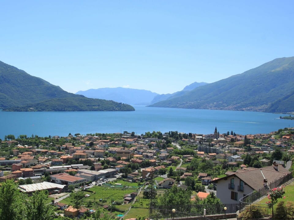 Water, Sky, Mountain, Water Resources, Plant, Azure, Building, Tree, Highland, Natural Landscape