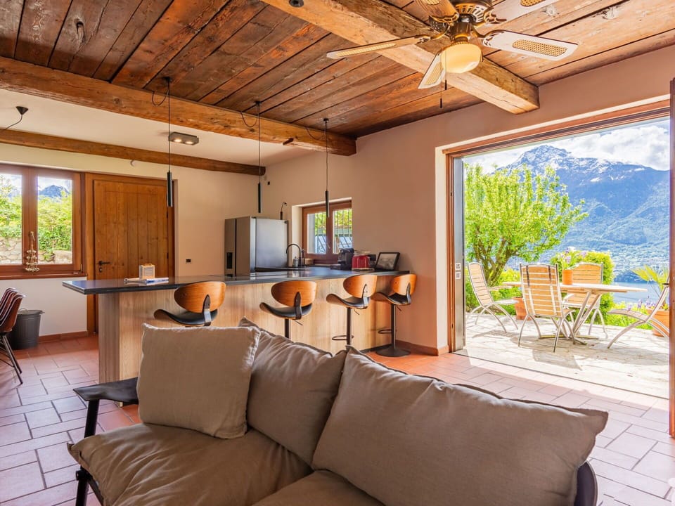 Furniture, Table, Wood, Interior Design, Window, Shade, Living Room, Floor, Chair, Plant