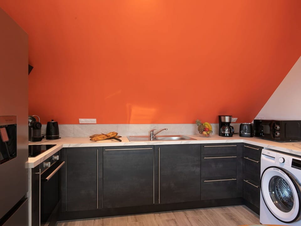Cabinetry, Laundry Room, Property, Building, Countertop, Kitchen Appliance, Kitchen Sink, Sink, Kitchen Stove, Wood