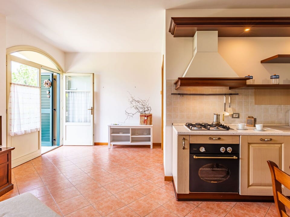 Cabinetry, Furniture, Countertop, Kitchen Stove, Wood, Interior Design, Drawer, Kitchen Appliance, Flooring, Floor