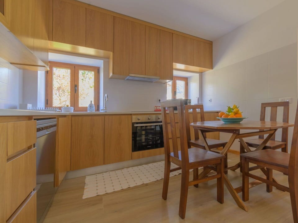 Cabinetry, Countertop, Property, Furniture, Kitchen Appliance, Building, Wood, Window, Kitchen, Kitchen Stove