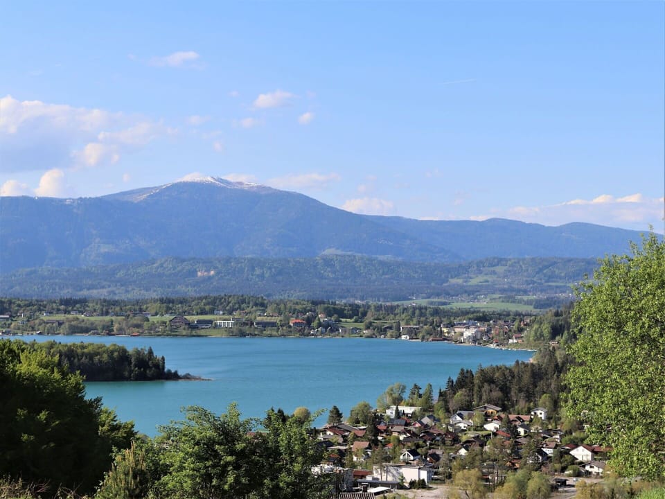Sky, Water, Cloud, Mountain, Plant, Azure, Tree, Natural Landscape, Highland, Coastal And Oceanic Landforms