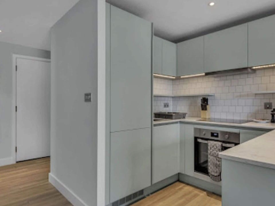 Cabinetry, Building, Countertop, Kitchen Stove, Wood, House, Kitchen Appliance, Home Appliance, Sink, Flooring