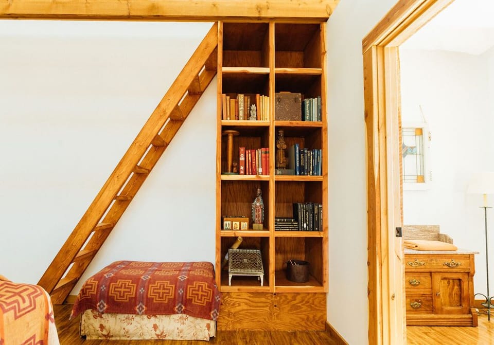 Ladder leading up to den with Bedroom 4