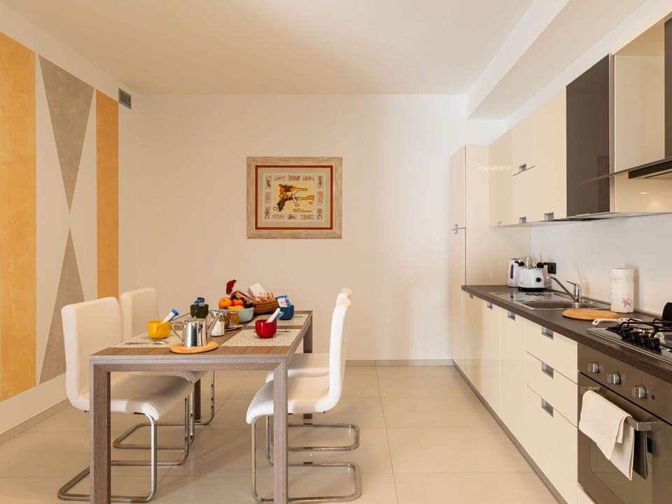 Furniture, Table, Cabinetry, Chair, Wood, Countertop, Building, Kitchen Stove, Floor, Drawer