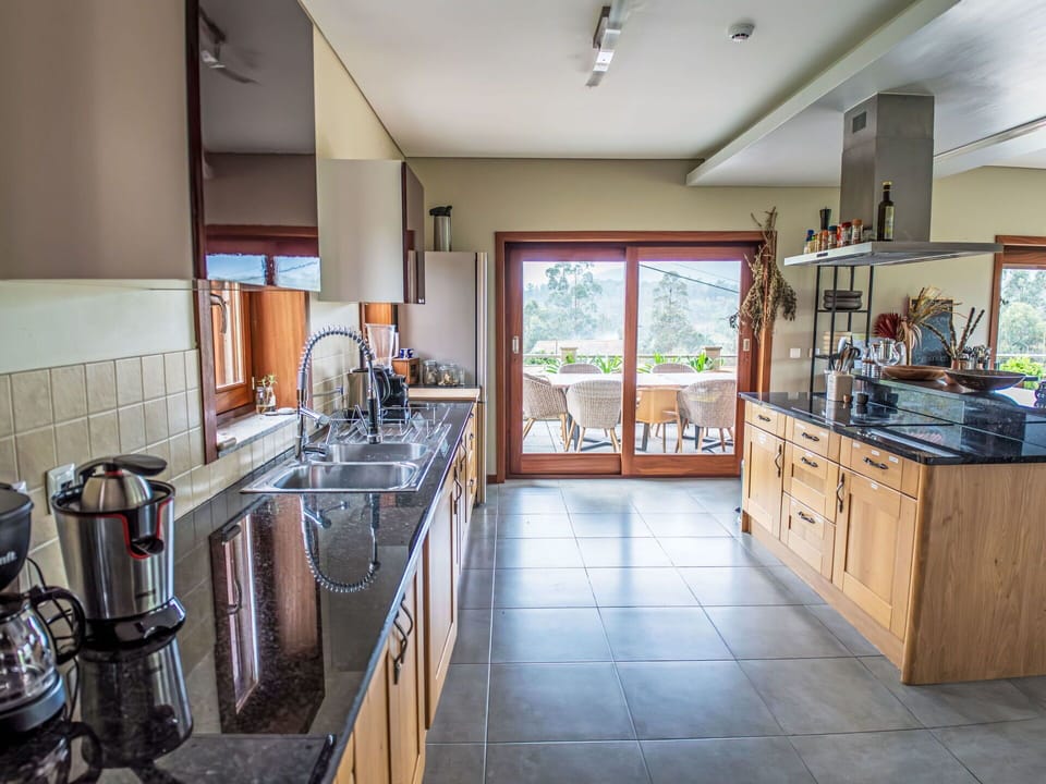 Cabinetry, Property, Countertop, Kitchen, Interior Design, Sink, Wood, Tap, Floor, Flooring