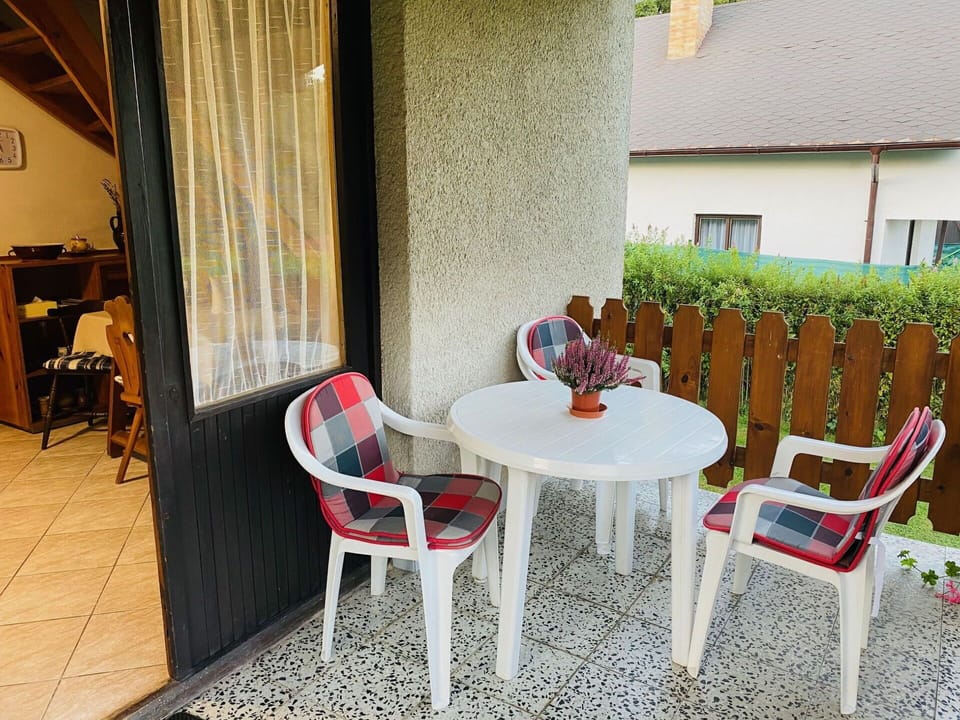 Furniture, Plant, Chair, Table, Window, Wood, Building, Outdoor Table, Interior Design, Outdoor Furniture