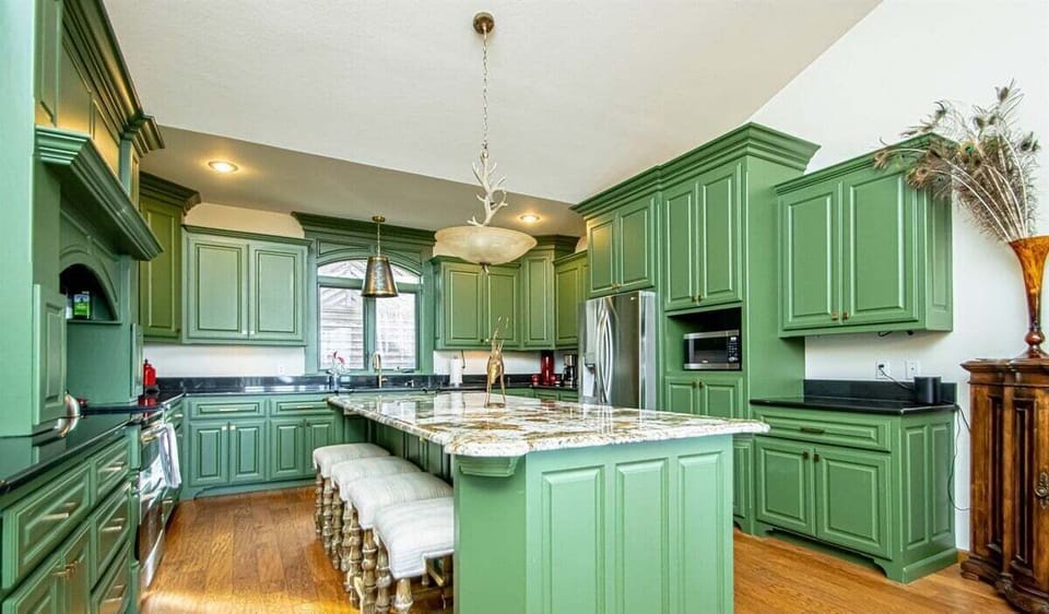 Bright and Open Kitchen with modern Stainless Steel Appliances