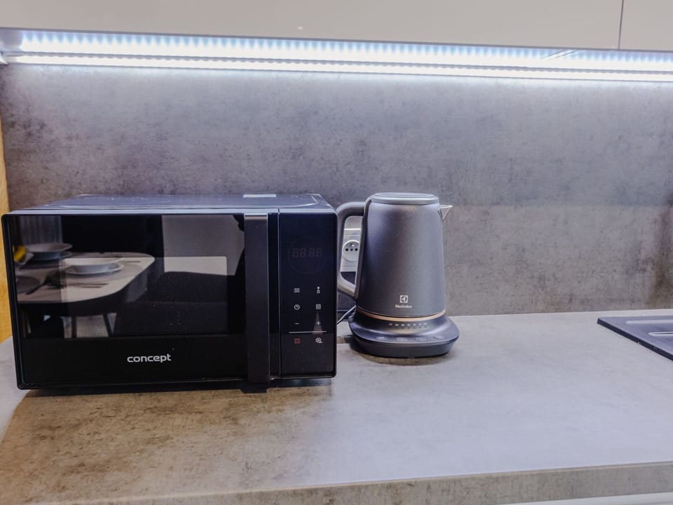 Countertop, Kitchen, Home Appliance, Kitchen Appliance, Interior Design, Floor, Kitchen Stove, Stove, Audio Equipment