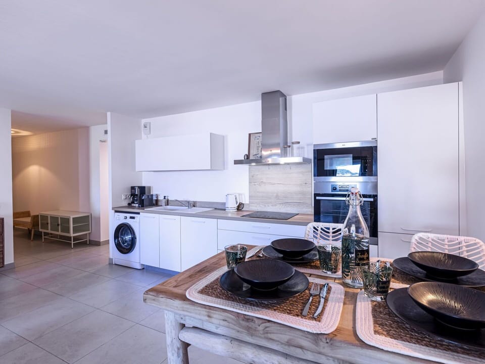 Cabinetry, Furniture, Countertop, Kitchen, Kitchen Stove, Kitchen Appliance, Home Appliance, Wood, Interior Design, Building