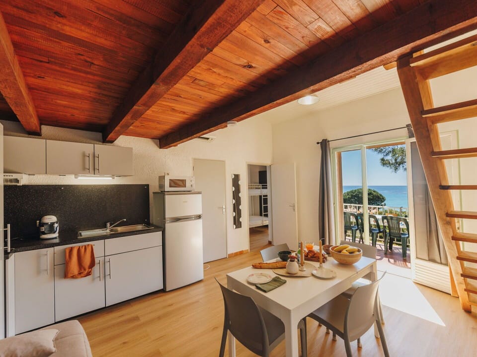 Wood Stain, Hardwood, Chair, Wood Flooring, Eco Hotel, Plank, Balcony, Kitchen & Dining Room Table, Deck