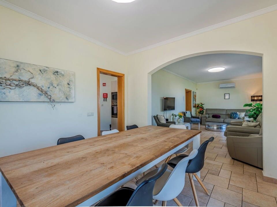 Furniture, Interior Design, Flooring, Floor, Wood, Ceiling, Table, Room, Lighting, Kitchen & Dining Room Table