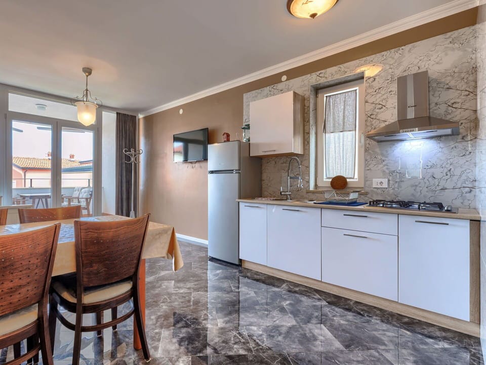 Cabinetry, Furniture, Countertop, Sink, Chair, Wood, Building, Lighting, Kitchen, Window