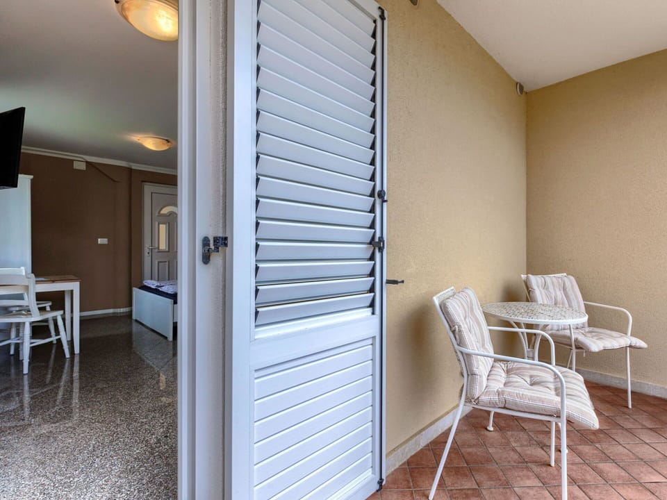 Furniture, Building, Wood, Shade, Chair, Comfort, Door, Hall, Floor