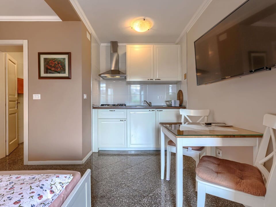 Cabinetry, Countertop, Wood, Lighting, Architecture, Interior Design, Drawer, Floor, Kitchen, Flooring