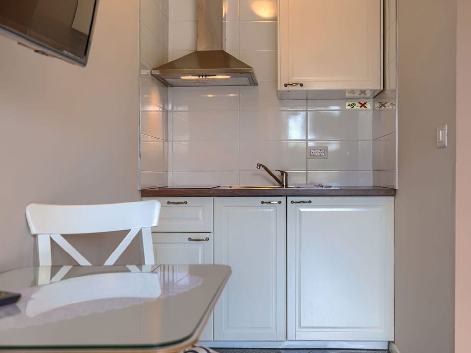Cabinetry, Countertop, Building, Kitchen Sink, Tap, Sink, Kitchen Appliance, Wood, Interior Design, Kitchen