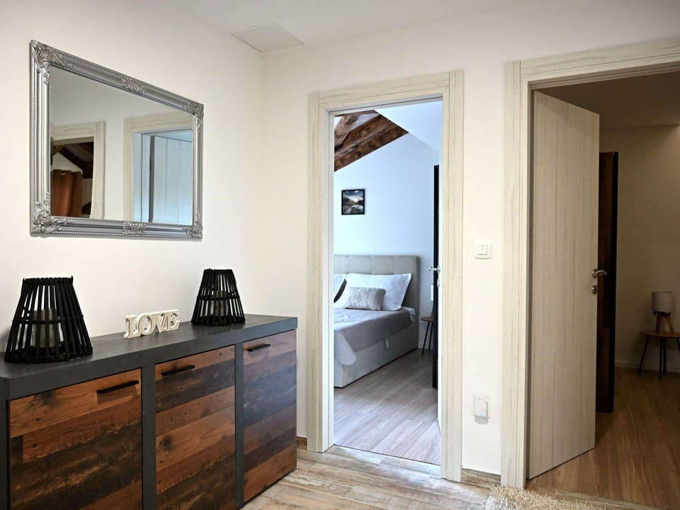 Mirror, Furniture, Property, Cabinetry, Building, Wood, Drawer, Architecture, Door, Flooring